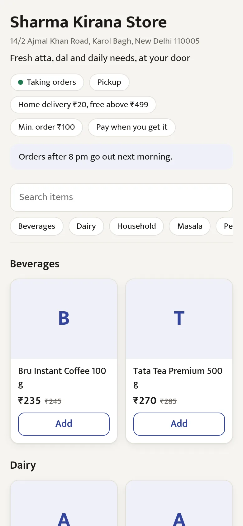 Sharma Kirana Store's ordering page on a phone: taking orders, pickup, home delivery ₹20 free above ₹499
